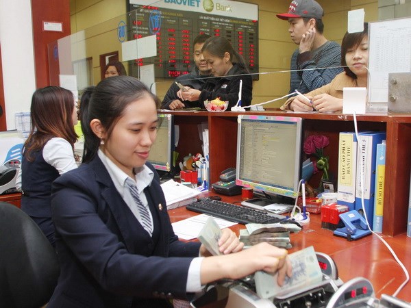 Những tín hiệu khả quan cho thị trường tiền tệ năm 2014