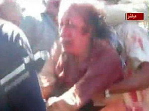 Ông Gaddafi bị bắt sống rồi mới bị NTC bắn chết? Ông Gaddafi bị bắt sống rồi mới bị NTC bắn chết?