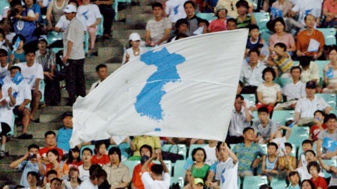 99634214koreaunitedflagafp19012018085146.jpg