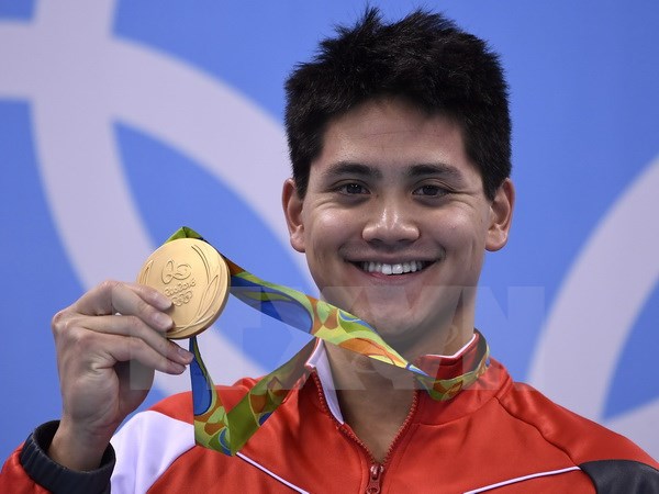 Chân dung người "cướp vàng" của kình ngư Michael Phelps Chân dung người "cướp vàng" của kình ngư Michael Phelps