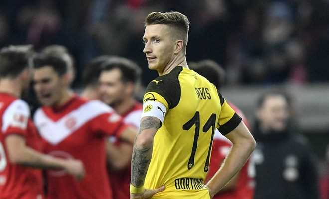 Dortmund thua đội 'cầm đèn đỏ,' Bundesliga nóng trước Giáng sinh
