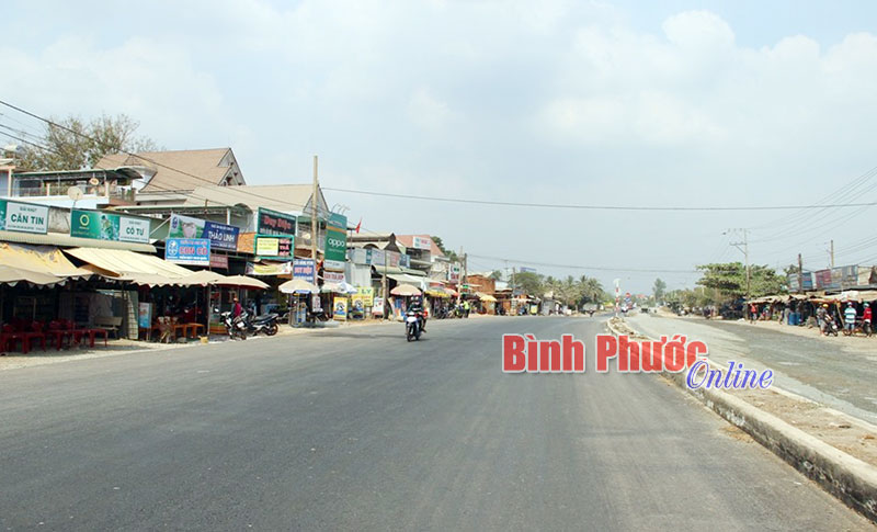 Thông tuyến quốc lộ 13 trước tết Thông tuyến quốc lộ 13 trước tết