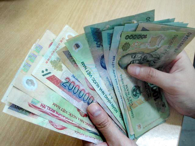 Từ 1-7-2013, mức lương cơ sở sẽ là 1.150.000 đồng/tháng.