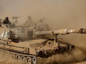 Xe tăng Israel đồng loạt áp sát đường biên giới Syria Xe tăng Israel đồng loạt áp sát đường biên giới Syria