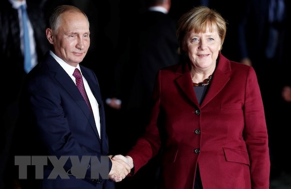 ttxvn1908putinmerkel19082018025005.jpeg