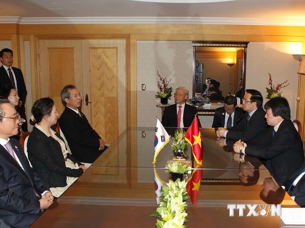 ttxvn_Nguyen_Phu_Trong_TBT_Busan_0310.jpg